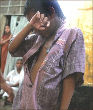 a crying slum boy